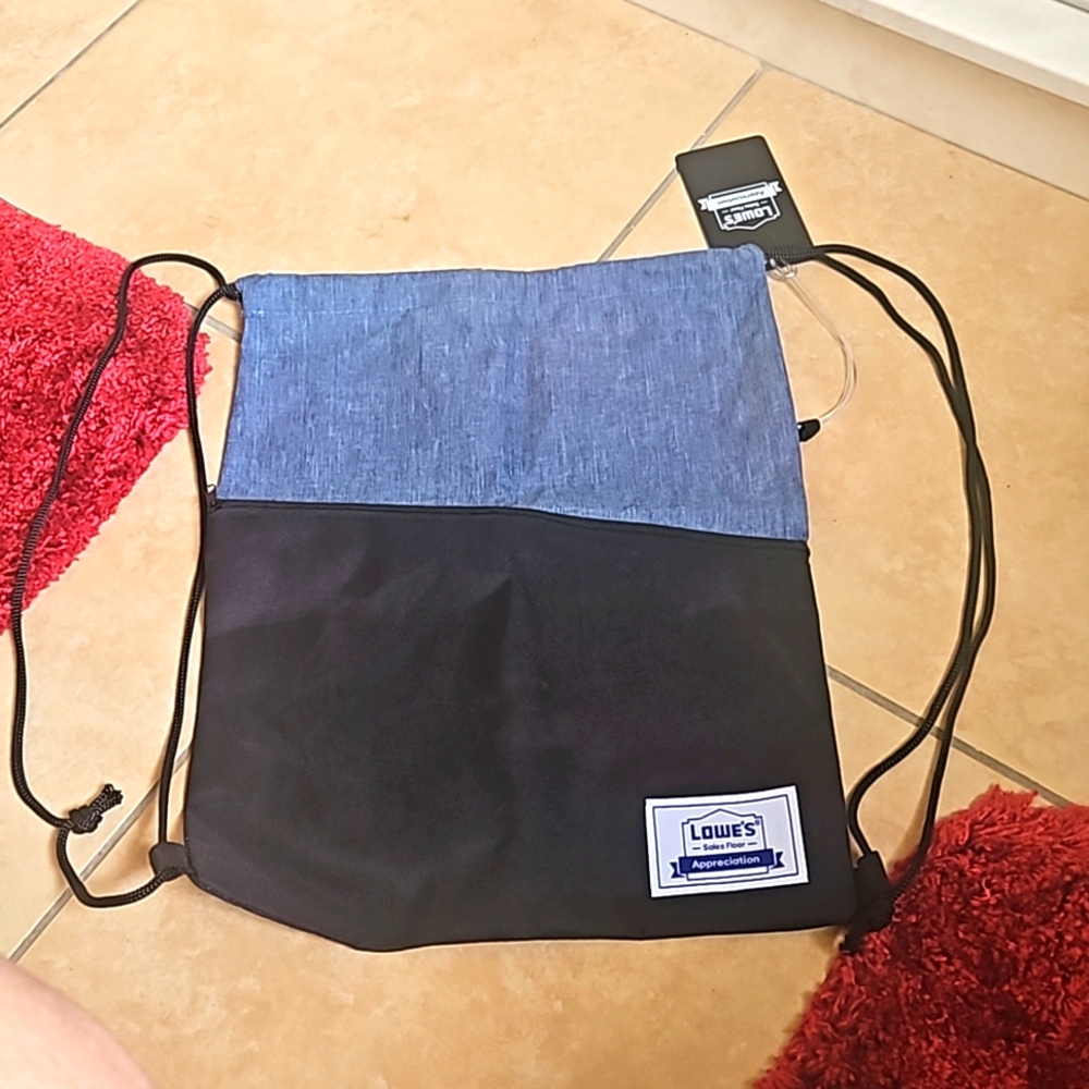 NAP SACK NWT Blue jean w/ badge spot. Great gift idea